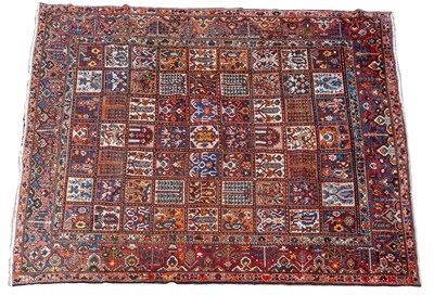 Lot 186 - A mid-20th-century hand-woven Kashan style carpet