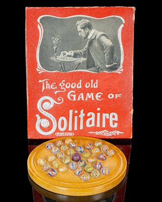 Lot 1301 - A solitaire board