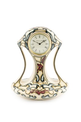 Lot 542 - Black Ryden Pottery Clock Time Flight pattern,...