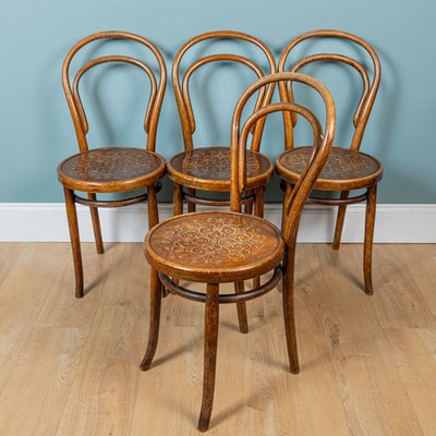 Lot 169 - A set of four bentwood chairs