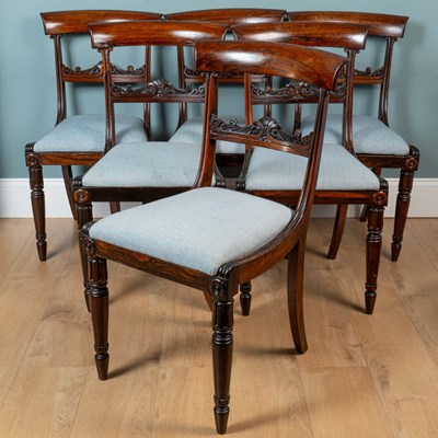 Lot 387 - A Regency rosewood circular dining table, together with six bar-back dining chairs