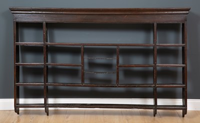 Lot 478 - An antique oak wall hanging shelving unit...