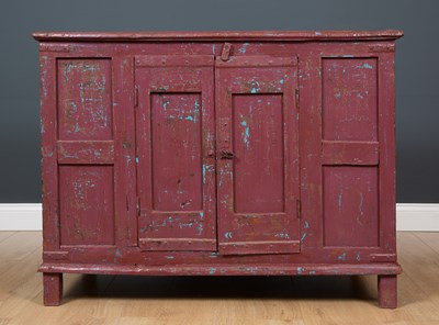 Lot 456 - A 19th century painted hardwood cupboard with...
