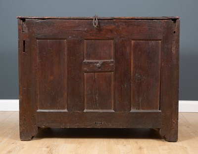 Lot 483 - An 18th century oak chest of panelled...