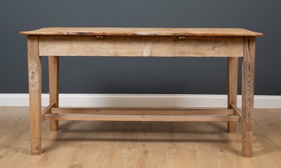 Lot 466 - A late 19th century pine kitchen table, the...