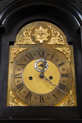 Lot 84 - A Victorian ebonised longcase clock with fret...