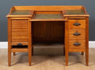 Lot 80 - A late 19th / early 20th century light oak...