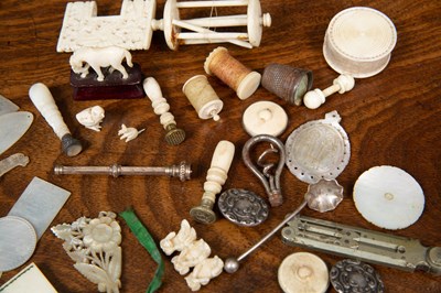 Lot 34 - A 19th century Chinese carved ivory needle...