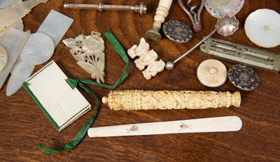 Lot 34 - A 19th century Chinese carved ivory needle...