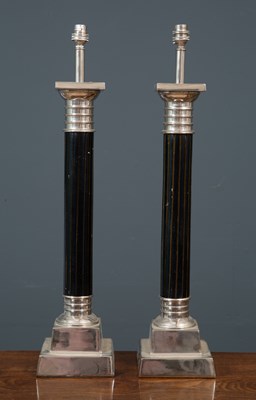 Lot 441 - A pair of metal and ebonised wood table lamps...