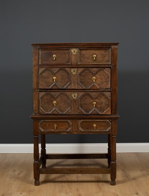 Lot 455 - A 17th century style oak chest of three...