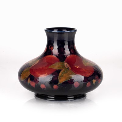 Lot 381 - Moorcroft pottery 'Pomegranate' squat vase,...