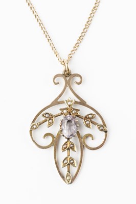 Lot 72 - An Edwardian amethyst and half pearl pendant,...