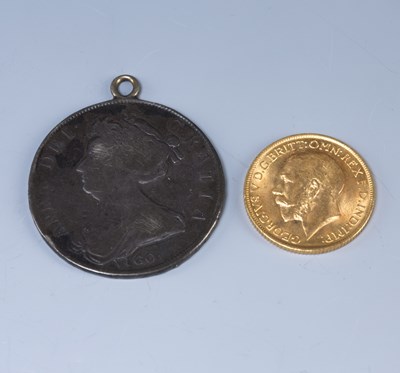 Lot 235 - George V sovereign dated 1914 in fitted case,...