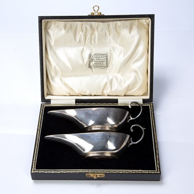 Lot 491 - Pair of cased silver sauce boats bearing marks...