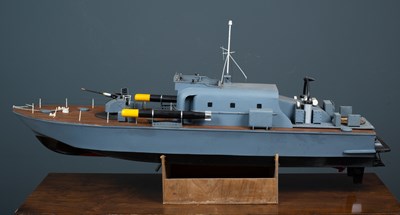 Lot 132 - A model torpedo boat with machine gun and two...