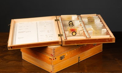 Lot 40 - Four wooden cases of glass microscope slides...