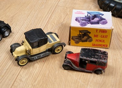 Lot 106 - A collection of toy tractors to include an...