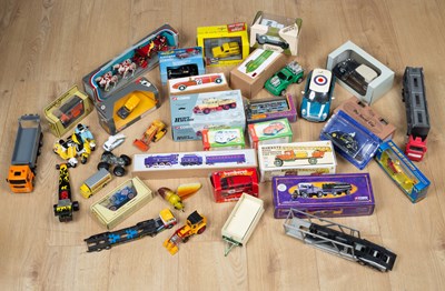 Lot 102 - A collection of mostly boxed toy cars to...