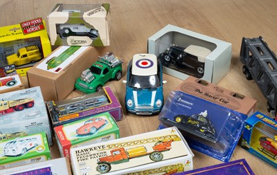 Lot 102 - A collection of mostly boxed toy cars to...