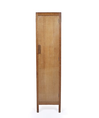 Lot 84 - In the manner of Heals Oak, single wardrobe or...