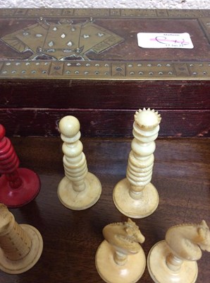 Lot 88 - A 19th century turned and stained ivory chess...