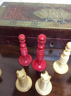 Lot 88 - A 19th century turned and stained ivory chess...