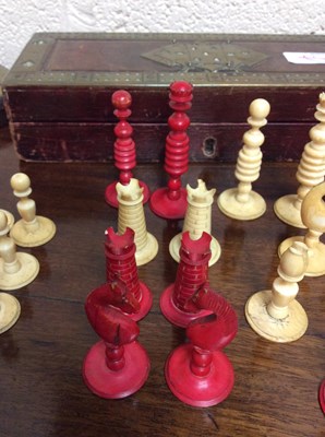 Lot 88 - A 19th century turned and stained ivory chess...