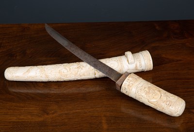 Lot 65 - A 19th C Japanese carved ivory short sword or...