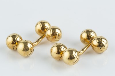 Lot 105 - A pair of cufflinks, each with chevron...