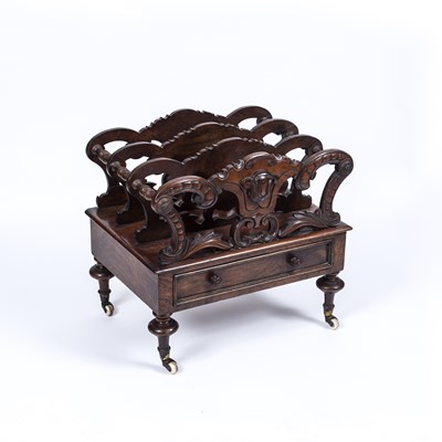 Lot 249 - A Victorian walnut canterbury with foliate...