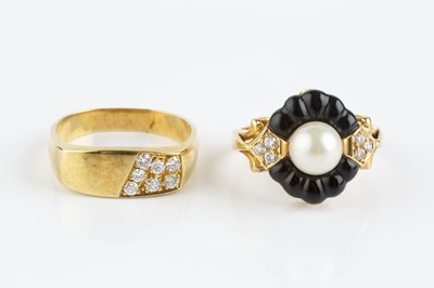 Lot 119 - A vari gem-set panel ring, centred with a...