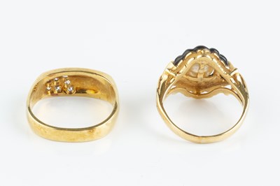 Lot 119 - A vari gem-set panel ring, centred with a...