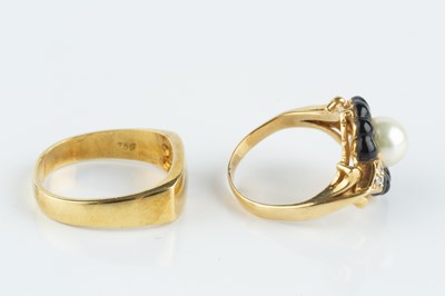 Lot 119 - A vari gem-set panel ring, centred with a...