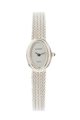 Lot 231 - A lady's bracelet watch by Bucherer, the oval...