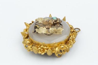 Lot 39 - A 19th century pendant/brooch, centred with a...