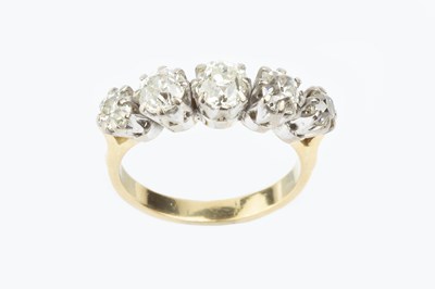 Lot 182 - A diamond five stone ring, the graduated...