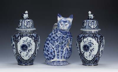 Lot 351 - Pair of Delft lidded baluster vases blue and...