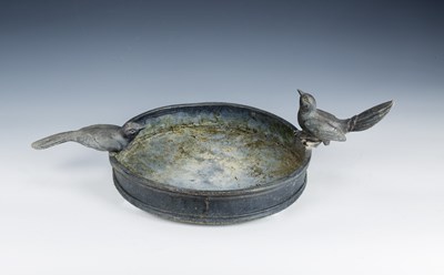 Lot 376 - Lead circular bird bath modelled with two...