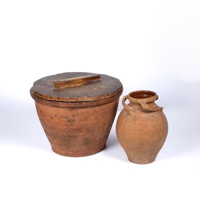 Lot 384 - Terracotta planter with a later wooden lid,...