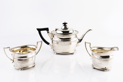 Lot 375 - An Edwardian Irish silver three piece tea...