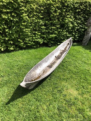 Lot 685 - An antique dugout canoe, with two paddles,...