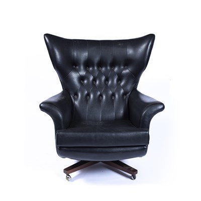 Lot 88 - G plan Black swivel chair, mid 20th Century,...