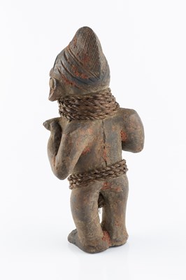 Lot 363 - A Yoruba Shango clay figure, in the form of a...