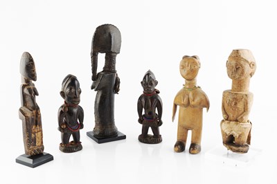 Lot 364 - An old African wood figure carved in the form...