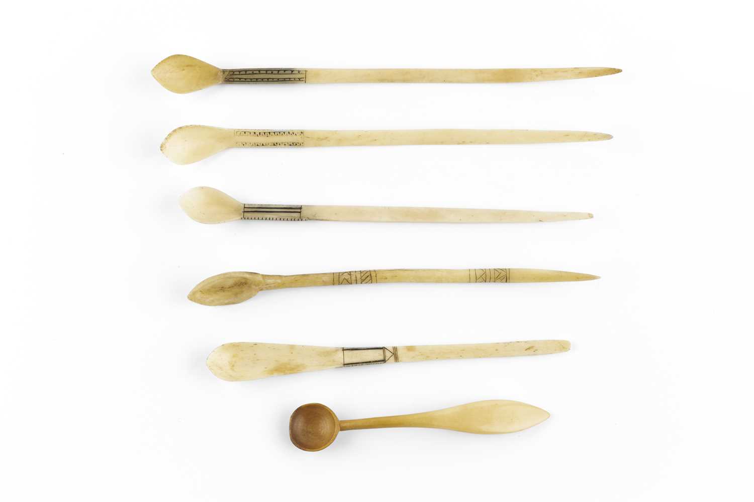 Lot 365 - A Zulu bone snuff spoon with circular bowl,...