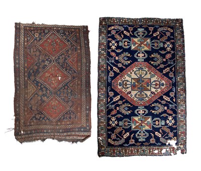 Lot 184 - Caucasian blue ground rug with central panel...