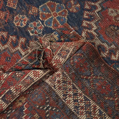 Lot 184 - Caucasian blue ground rug with central panel...