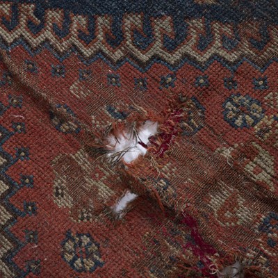 Lot 184 - Caucasian blue ground rug with central panel...
