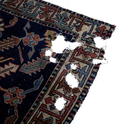 Lot 184 - Caucasian blue ground rug with central panel...